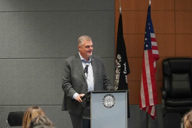 man at podium
